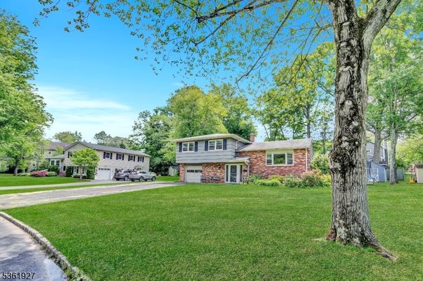 Attached, Backyard, Exterior, Facade, Brick Facade, Split Level