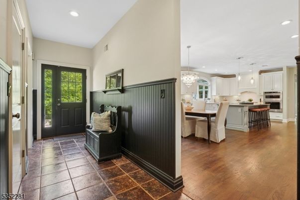 Chandelier, Dining room, Interior, Kitchen, Pendant Lights, Recessed Lighting, Stainless Steel Appliances, Wood Texture Flooring