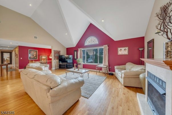 Fireplace, Interior, Living room, Recessed Lighting, Wood Texture Flooring
