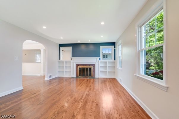 Empty room, Fireplace, Interior, Recessed Lighting, Wood Texture Flooring