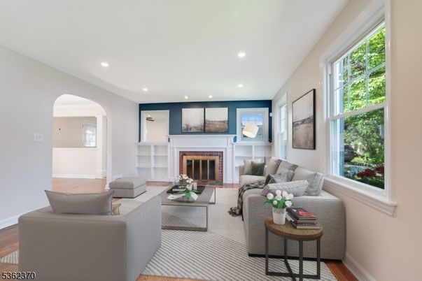 Fireplace, Interior, Living room, Recessed Lighting, Wood Texture Flooring