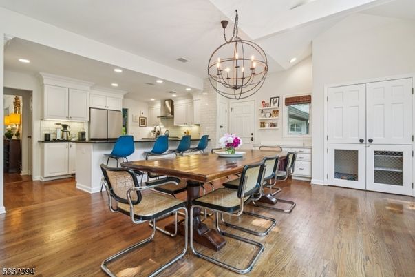 Chandelier, Dining room, Interior, Kitchen, Recessed Lighting, Stainless Steel Appliances, Wood Texture Flooring