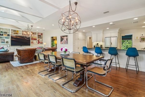 Chandelier, Dining room, Interior, Kitchen, Living room, Recessed Lighting, Stainless Steel Appliances, Wood Texture Flooring