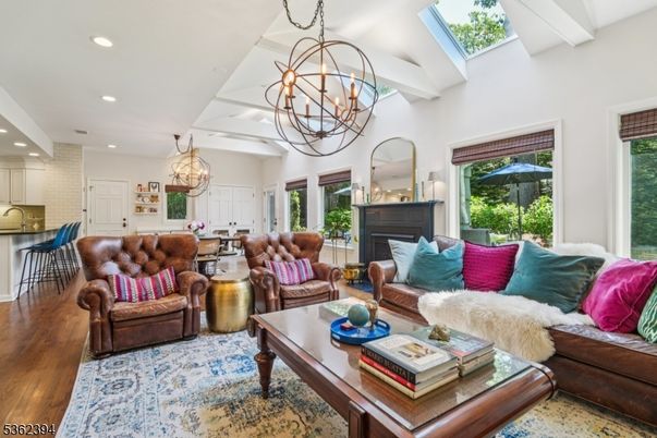 Chandelier, Dining room, Fireplace, Interior, Living room, Recessed Lighting, Wood Texture Flooring