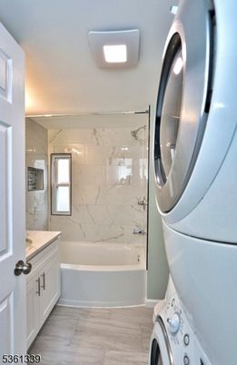 Bathroom, Interior, Marble Walls, Washer, Wood Texture Flooring