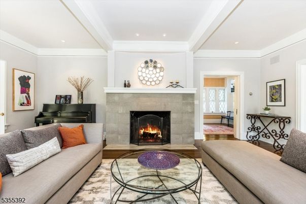 Fireplace, Interior, Living room, Piano, Recessed Lighting, Wood Texture Flooring