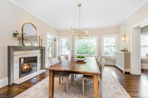 Dining room, Fireplace, Interior, Pendant Lights, Recessed Lighting, Wood Texture Flooring