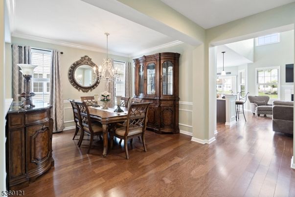Chandelier, Dining room, Fireplace, Interior, Living room, Pendant Lights, Wood Texture Flooring