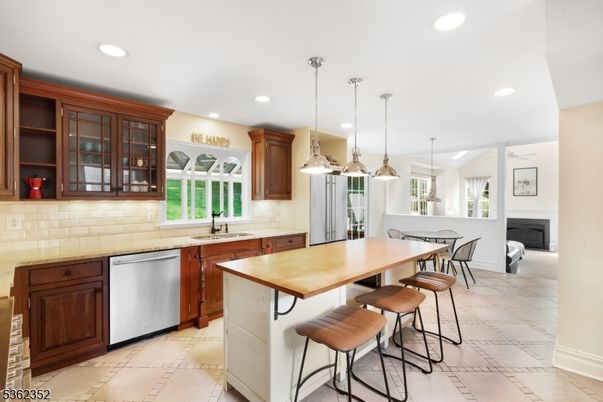 Dining room, Fireplace, Interior, Kitchen, Pendant Lights, Recessed Lighting, Stainless Steel Appliances