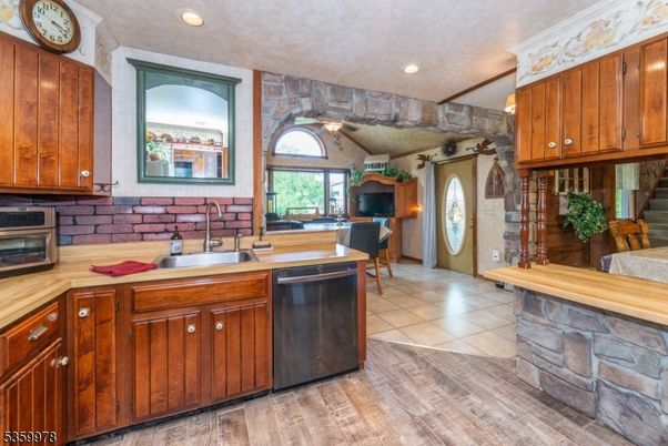 Interior, Kitchen, Recessed Lighting, Stone Walls, Wood Texture Flooring