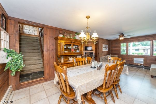 Chandelier, Dining room, Fireplace, Interior, Wooden Walls