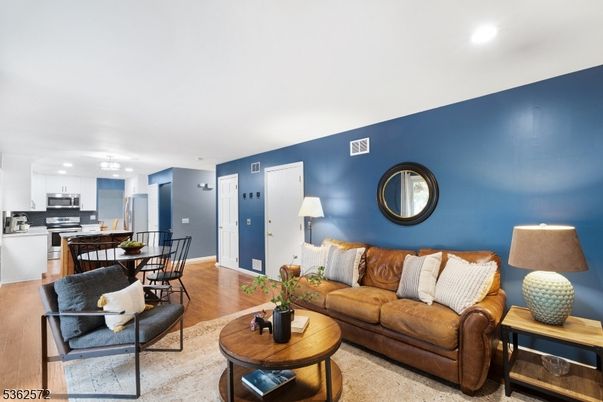 Dining room, Interior, Kitchen, Living room, Recessed Lighting, Stainless Steel Appliances, Wood Texture Flooring