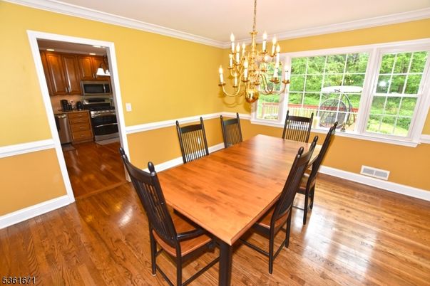 Chandelier, Dining room, Interior, Wood Texture Flooring