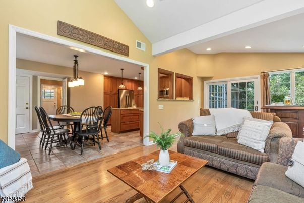 Dining room, Interior, Kitchen, Living room, Pendant Lights, Recessed Lighting, Stainless Steel Appliances, Wood Texture Flooring