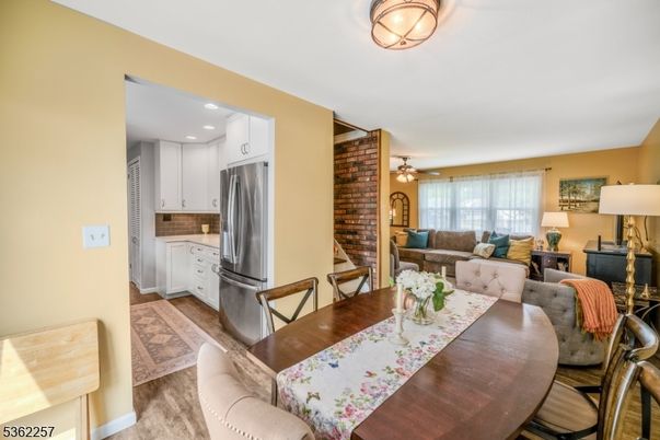 Dining room, Interior, Kitchen, Living room, Recessed Lighting, Stone Walls, Wood Texture Flooring