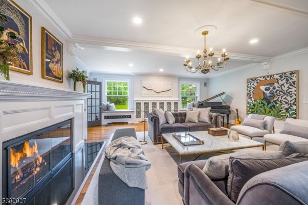 Chandelier, Fireplace, Interior, Living room, Piano, Recessed Lighting, Wood Texture Flooring