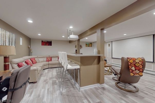 Interior, Living room, Pendant Lights, Projection Screen, Recessed Lighting, Wood Texture Flooring