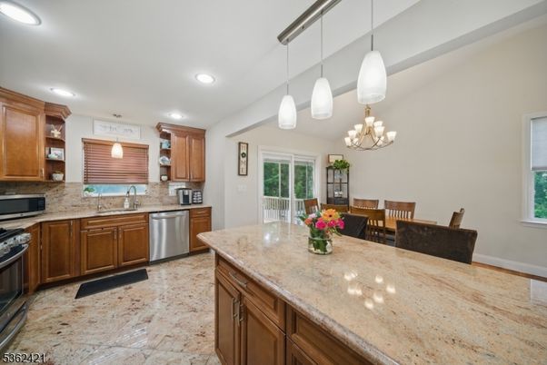 Chandelier, Dining room, Interior, Kitchen, Pendant Lights, Recessed Lighting, Stainless Steel Appliances