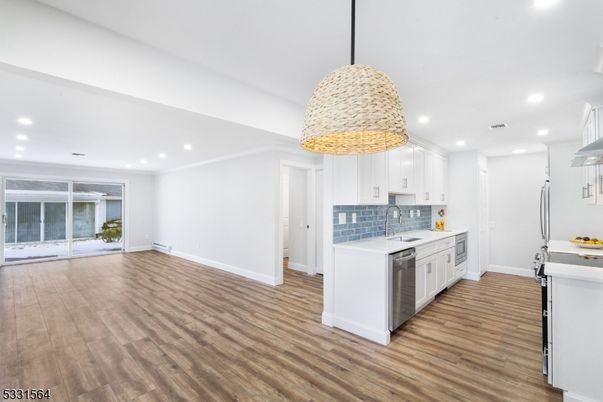 Interior, Kitchen, Pendant Lights, Recessed Lighting, Stainless Steel Appliances, Wood Texture Flooring