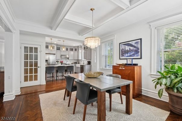 Chandelier, Dining room, Interior, Kitchen, Pendant Lights, Stainless Steel Appliances, Wood Texture Flooring