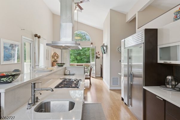 Dining room, Interior, Kitchen, Pendant Lights, Stainless Steel Appliances, Wood Texture Flooring