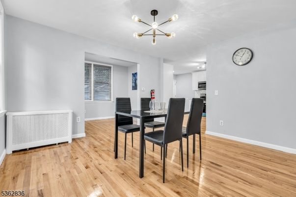 Dining room, Interior, Kitchen, Pendant Lights, Stainless Steel Appliances, Wood Texture Flooring