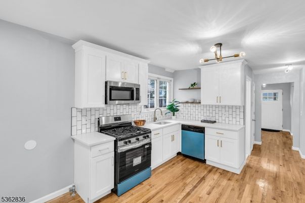 Interior, Kitchen, Tile Countertops, Wood Texture Flooring