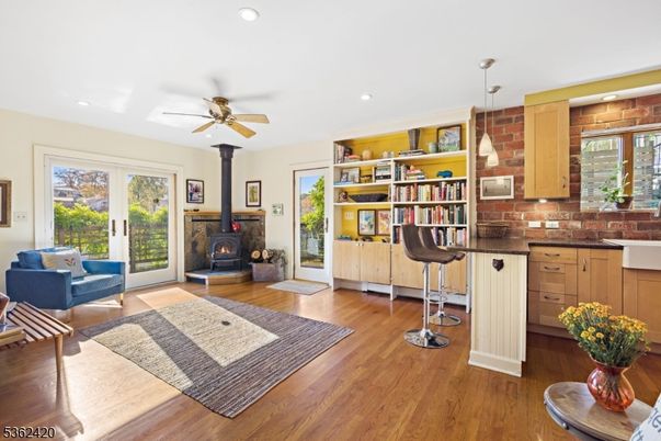 Fireplace, Interior, Pendant Lights, Recessed Lighting, Stone Walls, Wood Texture Flooring