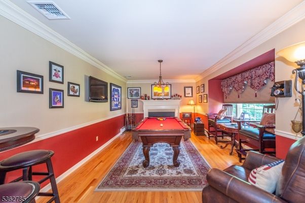 Billiard Table, Fireplace, Game Room, Home Office, Interior, Pendant Lights, Wood Texture Flooring