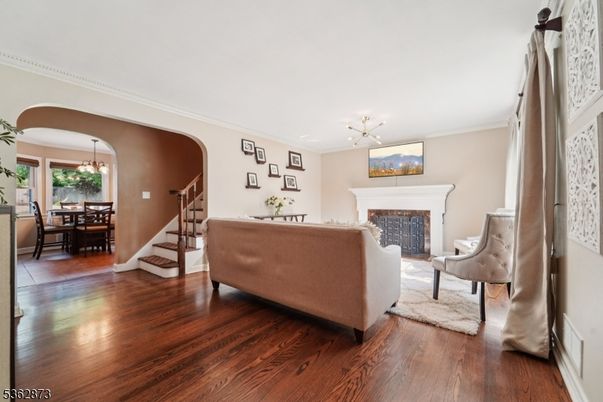 Chandelier, Dining room, Fireplace, Interior, Living room, Pendant Lights, Wood Texture Flooring