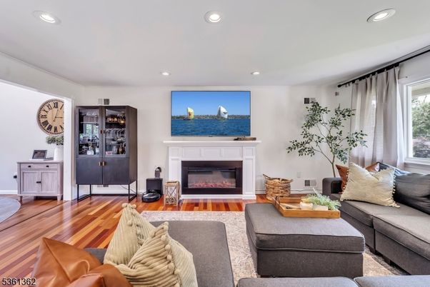 Fireplace, Interior, Living room, Recessed Lighting, Wood Texture Flooring