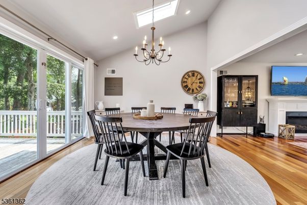 Chandelier, Dining room, Fireplace, Interior, Recessed Lighting, Wood Texture Flooring