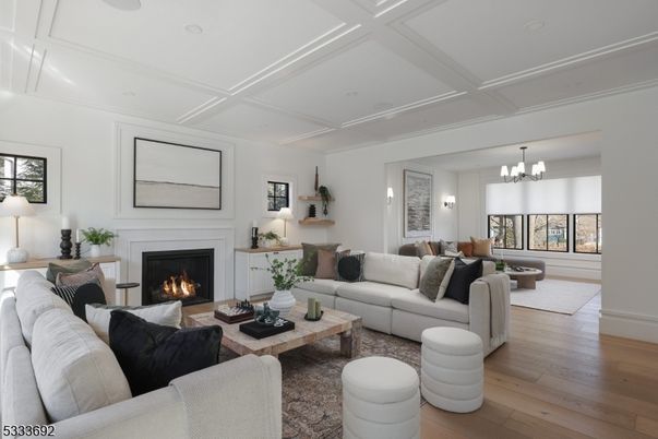 Chandelier, Fireplace, Interior, Living room, Recessed Lighting, Wood Texture Flooring