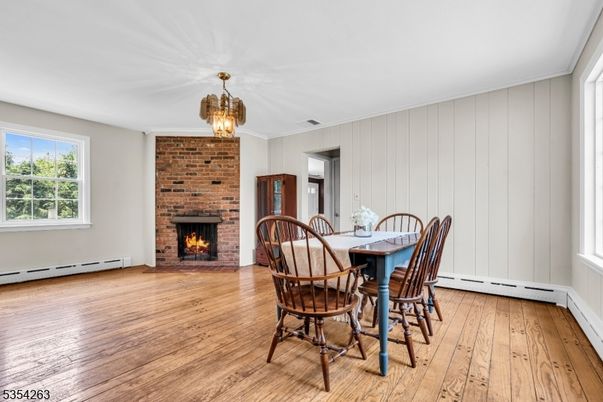 Dining room, Fireplace, Interior, Stone Walls, Wood Texture Flooring