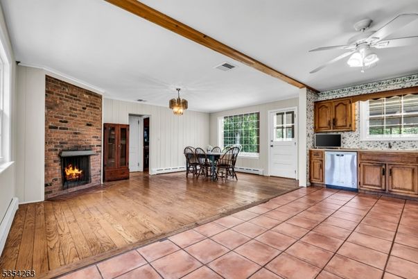Dining room, Fireplace, Interior, Kitchen, Pendant Lights, Stone Walls, Wooden Beams, Wood Texture Flooring