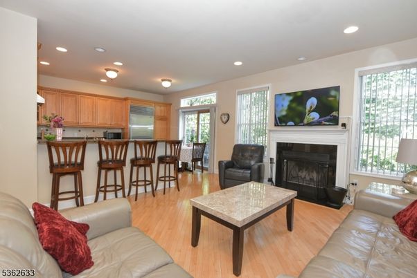 Fireplace, Interior, Kitchen, Living room, Recessed Lighting, Wood Texture Flooring