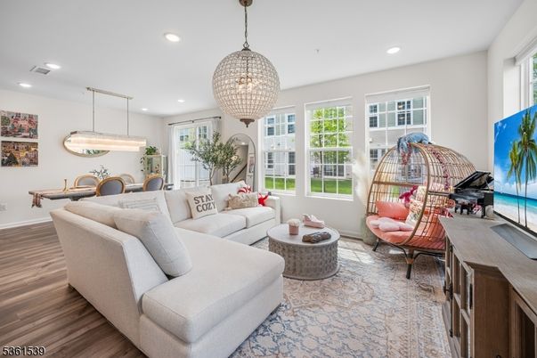 Dining room, Interior, Living room, Pendant Lights, Piano, Recessed Lighting, Wood Texture Flooring