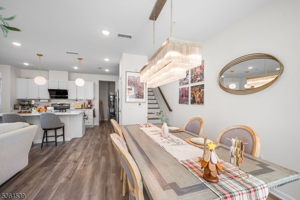 Dining room, Interior, Kitchen, Pendant Lights, Recessed Lighting, Stainless Steel Appliances, Wood Texture Flooring