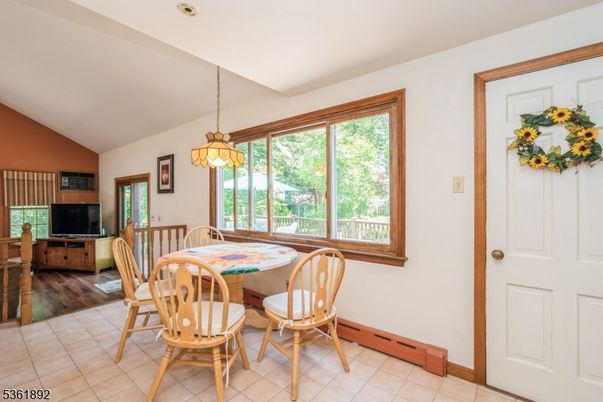 Dining room, Interior, Pendant Lights, Wood Texture Flooring
