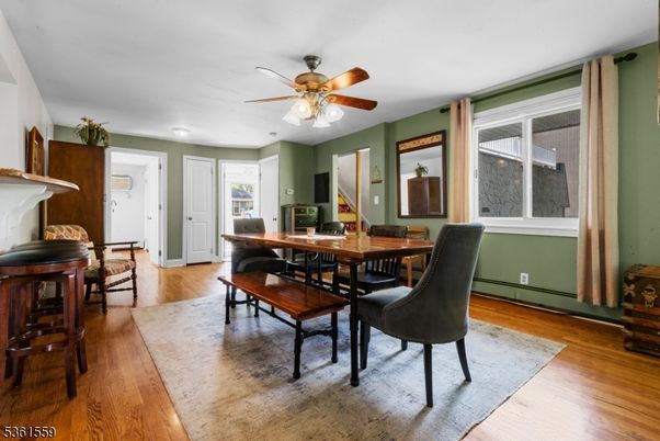 Dining room, Fireplace, Interior, Recessed Lighting, Wood Texture Flooring