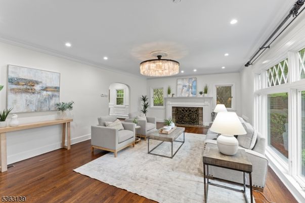 Chandelier, Fireplace, Interior, Living room, Recessed Lighting, Wood Texture Flooring