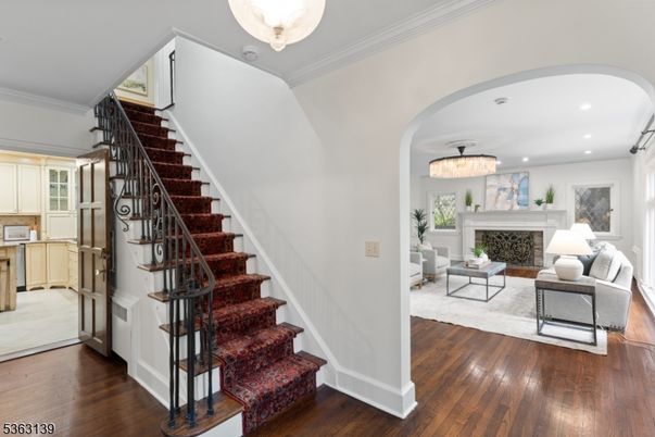 Chandelier, Fireplace, Interior, Living room, Pendant Lights, Recessed Lighting, Wood Texture Flooring