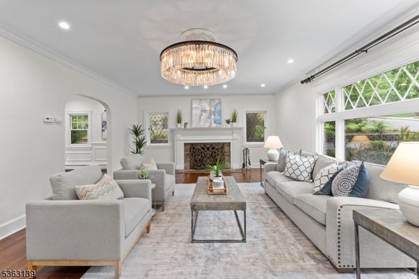 Chandelier, Fireplace, Interior, Living room, Recessed Lighting, Wood Texture Flooring