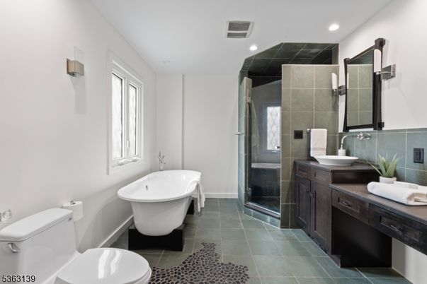 Bathroom, Dual Sink Vanities, Free Standing Baths, Glass Shower, Interior, Recessed Lighting