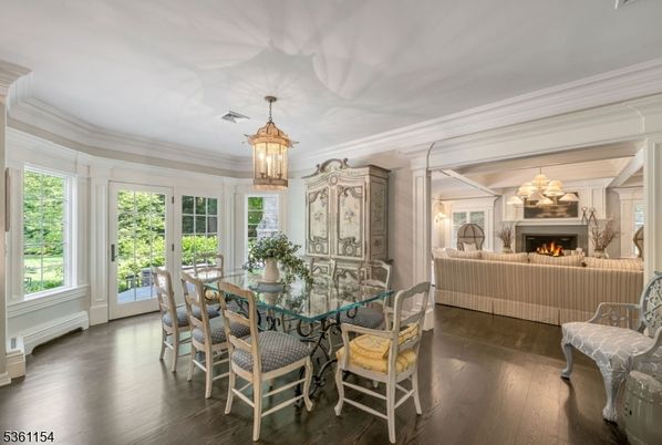 Chandelier, Dining room, Fireplace, Interior, Living room, Pendant Lights, Wood Texture Flooring
