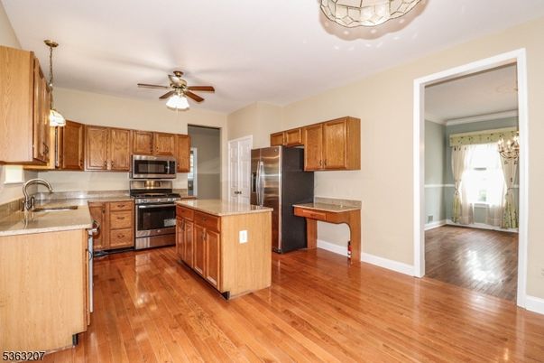 Interior, Kitchen, Pendant Lights, Stainless Steel Appliances, Wood Texture Flooring