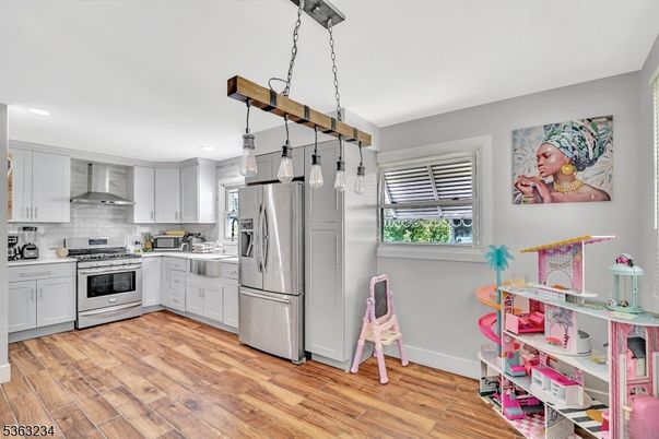 Interior, Kitchen, Pendant Lights, Recessed Lighting, Stainless Steel Appliances, Wood Texture Flooring