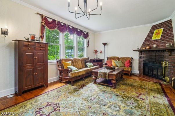 Chandelier, Fireplace, Interior, Living room, Stone Walls, Wood Texture Flooring