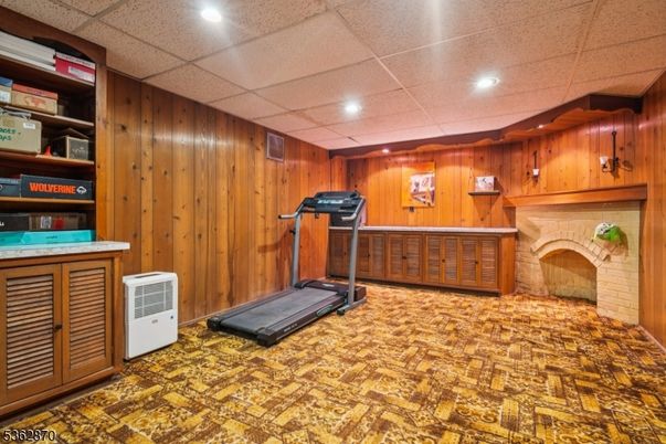 Fireplace, Fitness Equipment, Interior, Recessed Lighting, Wooden Walls