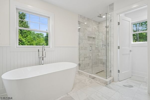 Bathroom, Free Standing Baths, Glass Shower, Interior, Marble, Marble Walls, Recessed Lighting